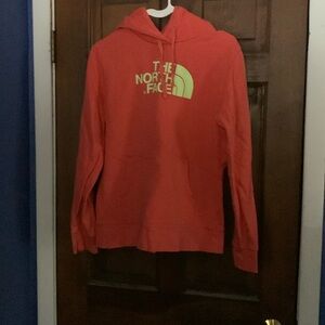 North Face, women’s orange sweatshirt